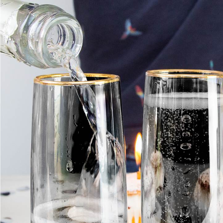 Stemless prosecco glass pouring champagne