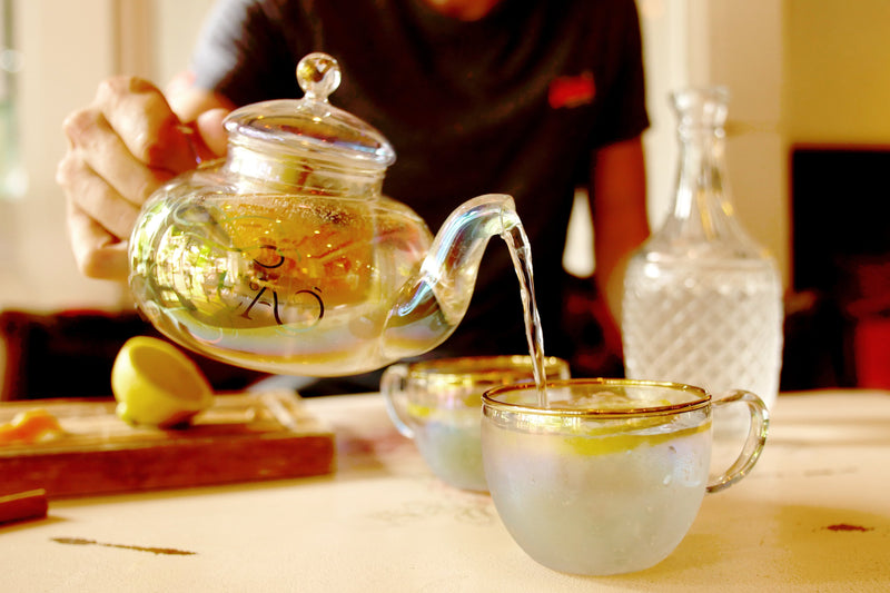 g-and-tea-teapot-set-pouring-glasses